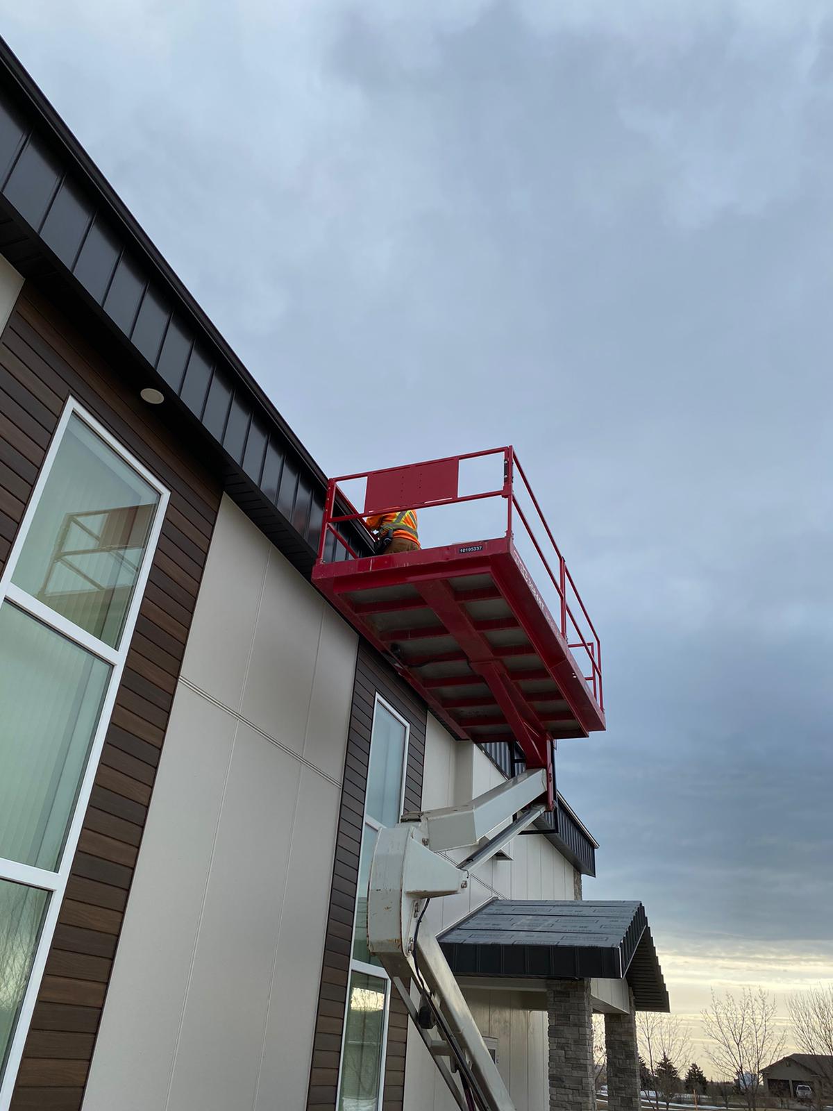 Eavestrough work from a lift